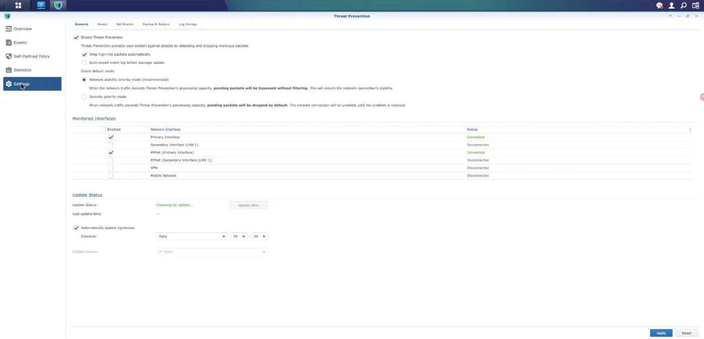 Threat Prevention settings showing monitored interfaces limited to the internet-facing ports, network stability priority mode and the ET Open signature source